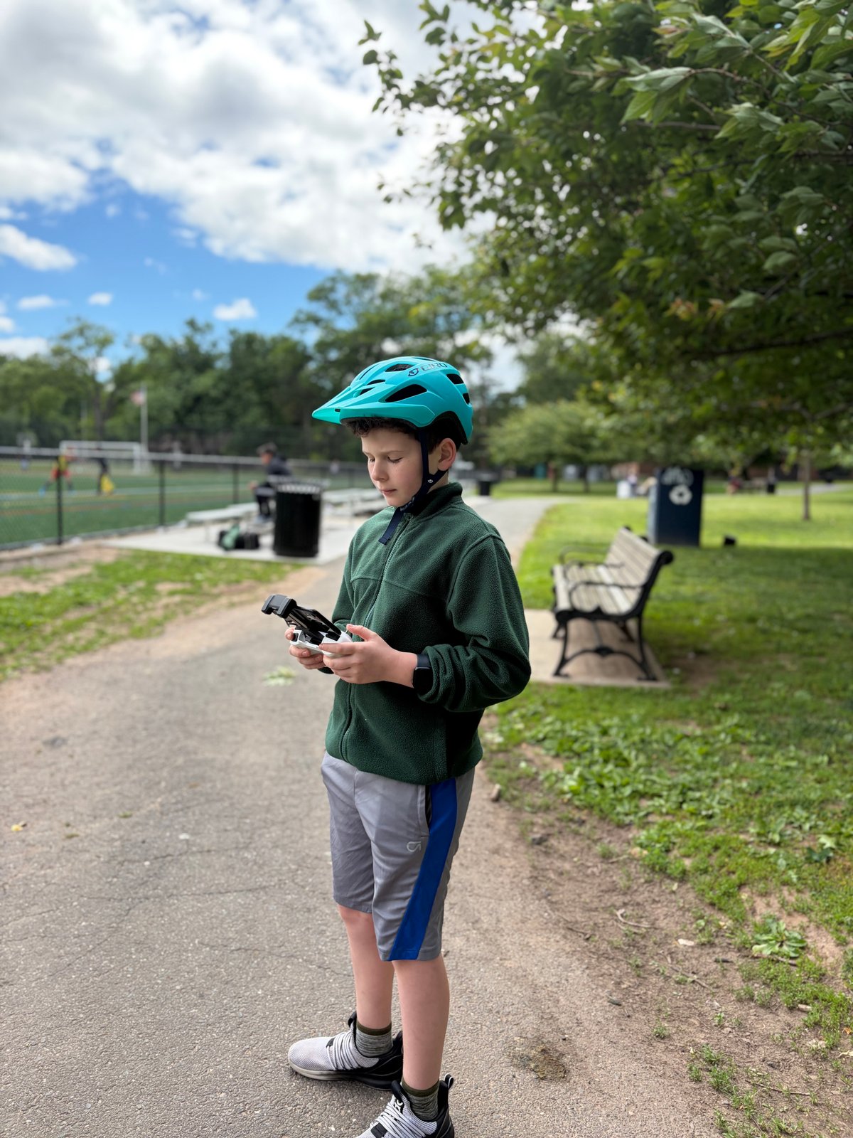 Samuel flying his drone